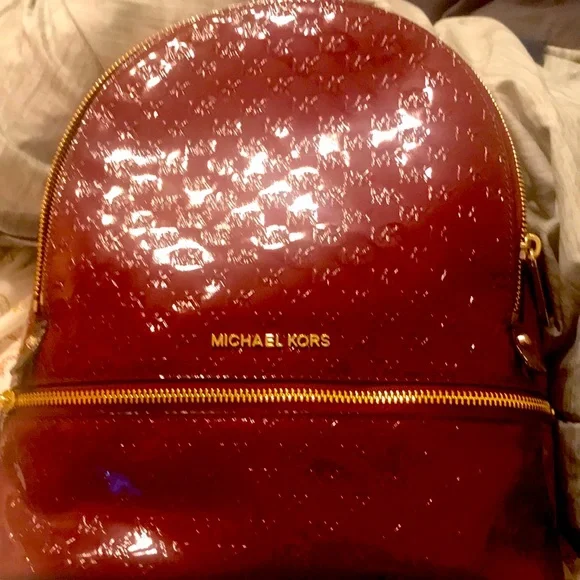 This rare Michael Kors Burgandy backpack is perfect for any lady on the go. Michael Kors Rhea Medium Signature Logo Backpack MK Powder  main image 4